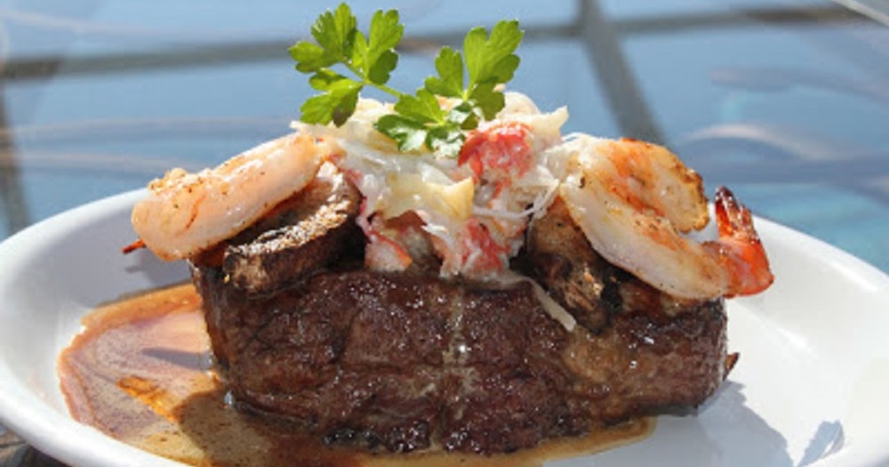 Filet Mignon Topped With Seafood And Wine Sauce What S Cookin Italian Style Cuisine