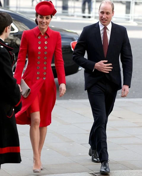 Meghan Markle wore Victoria Beckham printed crepe long sleeve midi dress, Kate Middleton wore a red coat by Catherine Walker