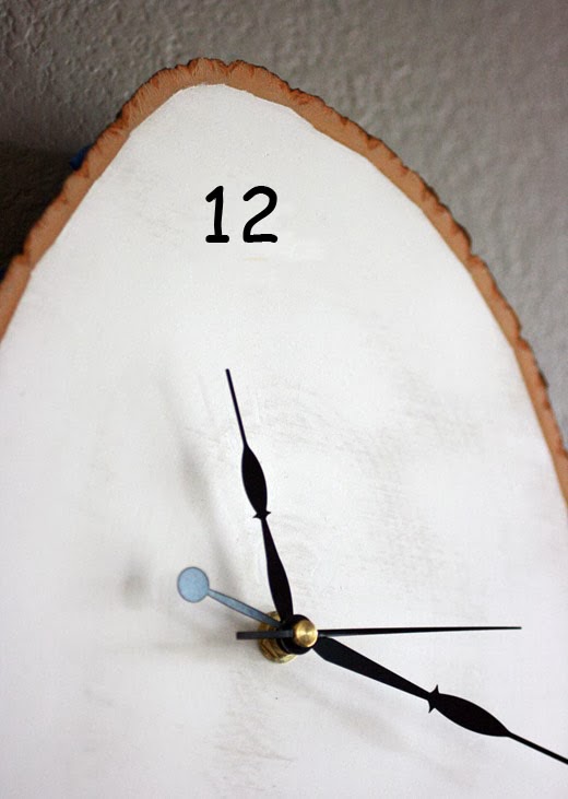 شكل الساعة بعد رسم رقم 12 بتقنية البوشوار