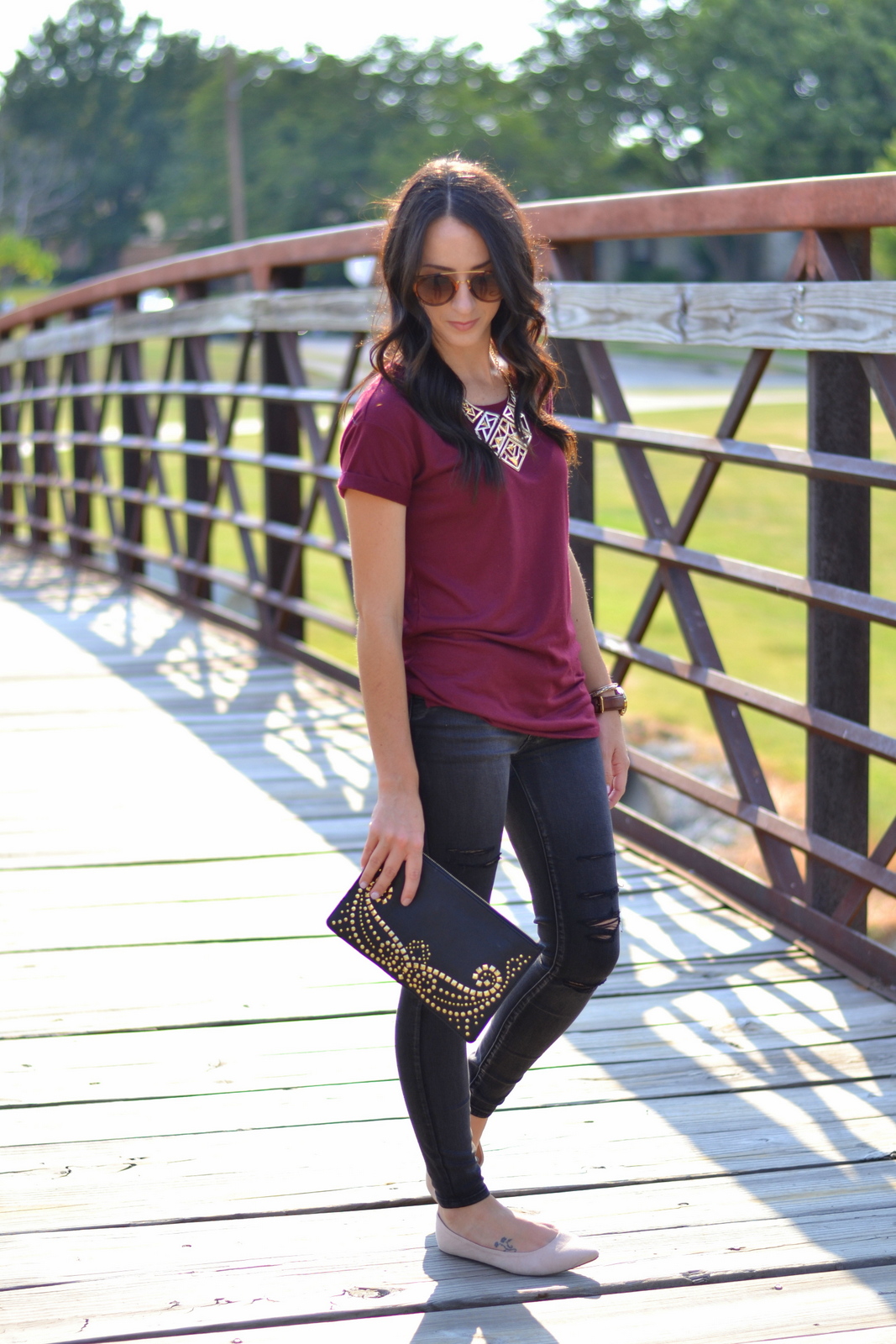 Ripped Black Jeans and Basic Tee for transitional look 