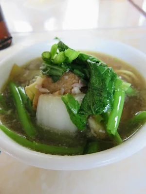 Muscovy duck soup ready to serve on our street food tour in Siem Reap Cambodia