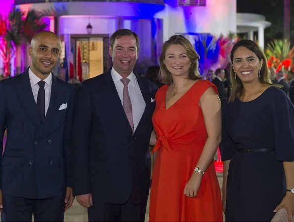 Prince Guillaume at Villa des Arts. Princess Stephanie wore Paule Ka Coral bow embellished midi dress