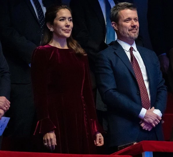 Crown Princess Mary wore a cherry wine colour tailored velvet midi dress by Beulah London and Pura Lopez Kameron pumps