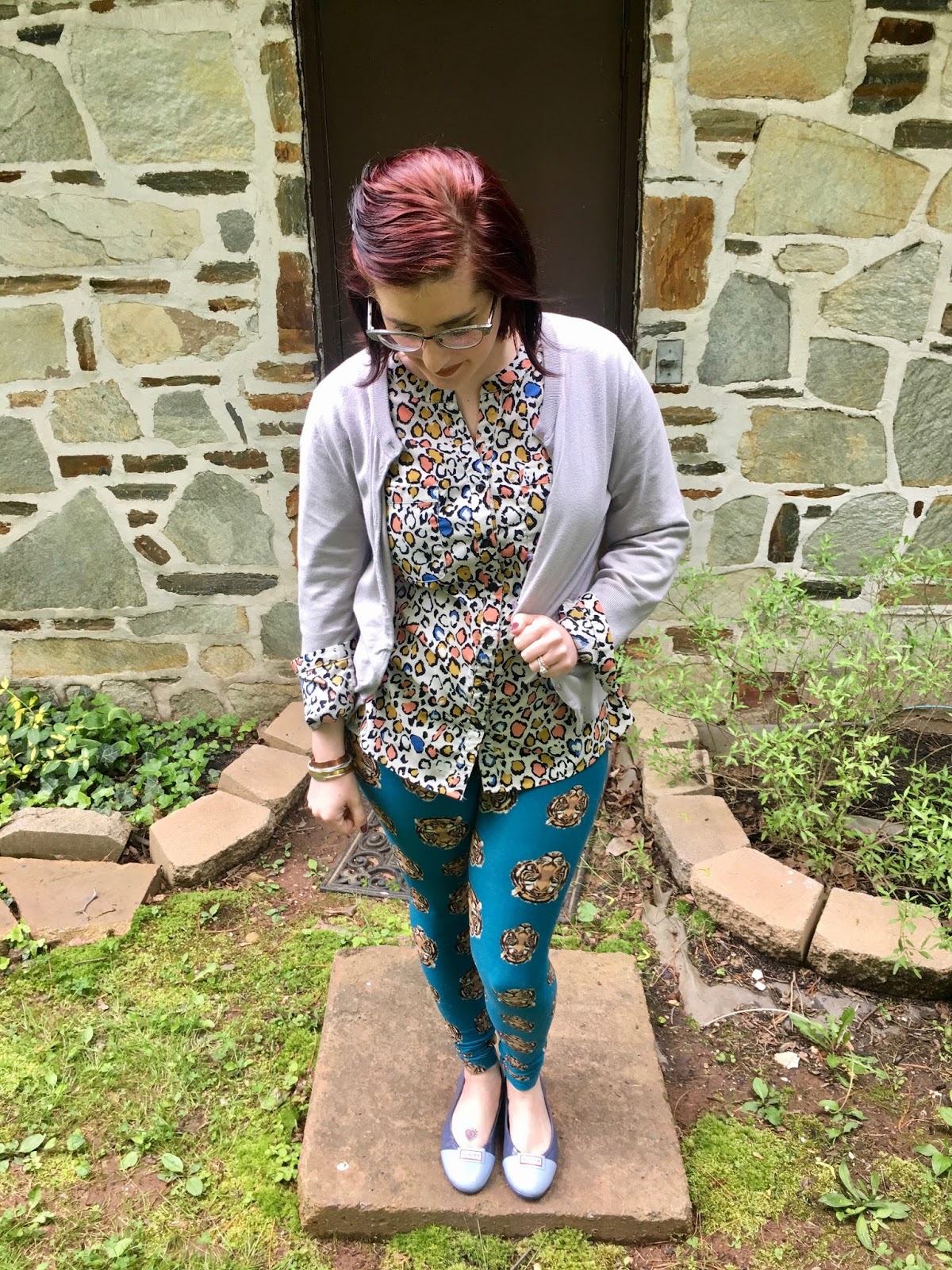 Behind The Leopard Glasses Tight As A Tiger Leopard Or Tabby Cat