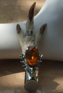 Cairngorm glass in a grouse foot brooch