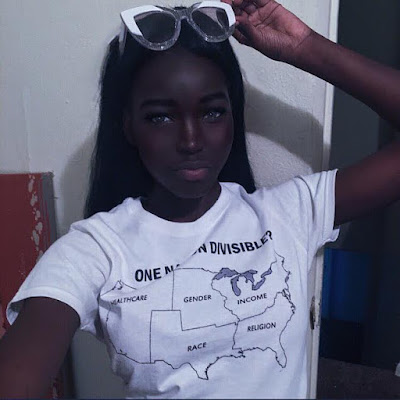 f Oh wow! Check out this lady who looks like a black version of Barbie (Photos)