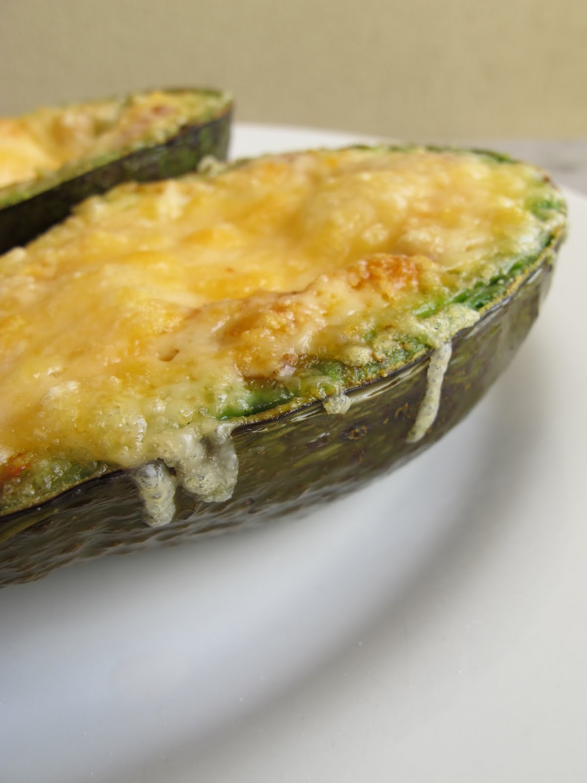 Morsels and Musings grilled avocado w melted cheese & hot sauce