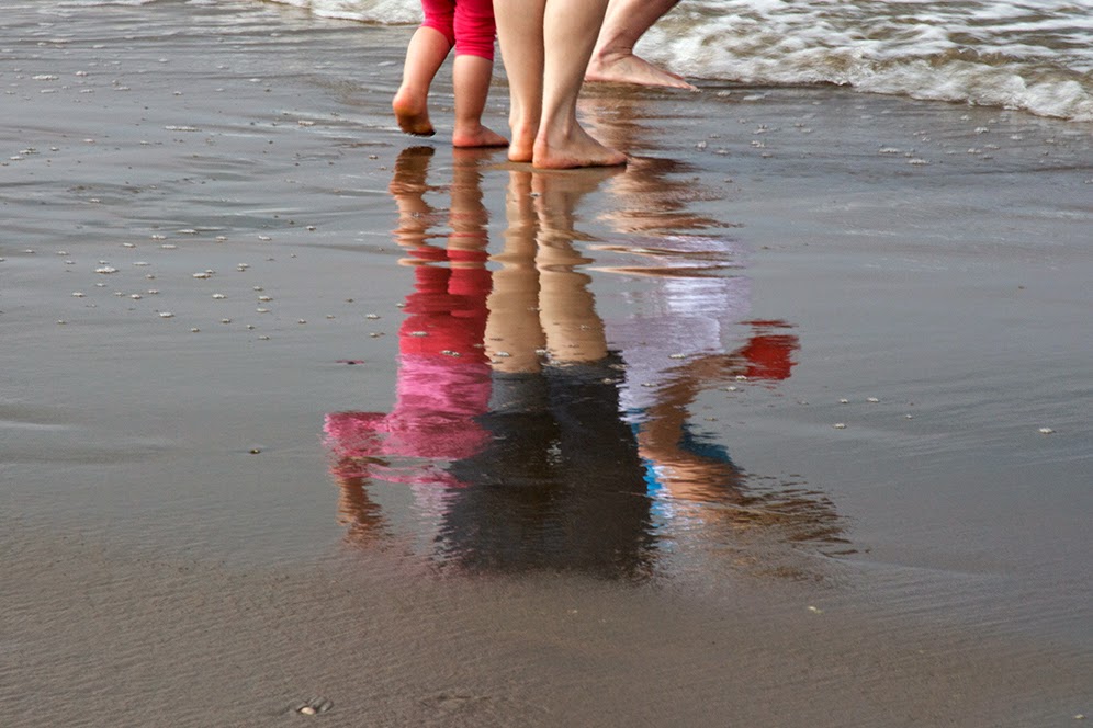 reflection of people in the water