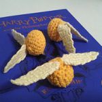 http://www.ravelry.com/patterns/library/mini-golden-snitch