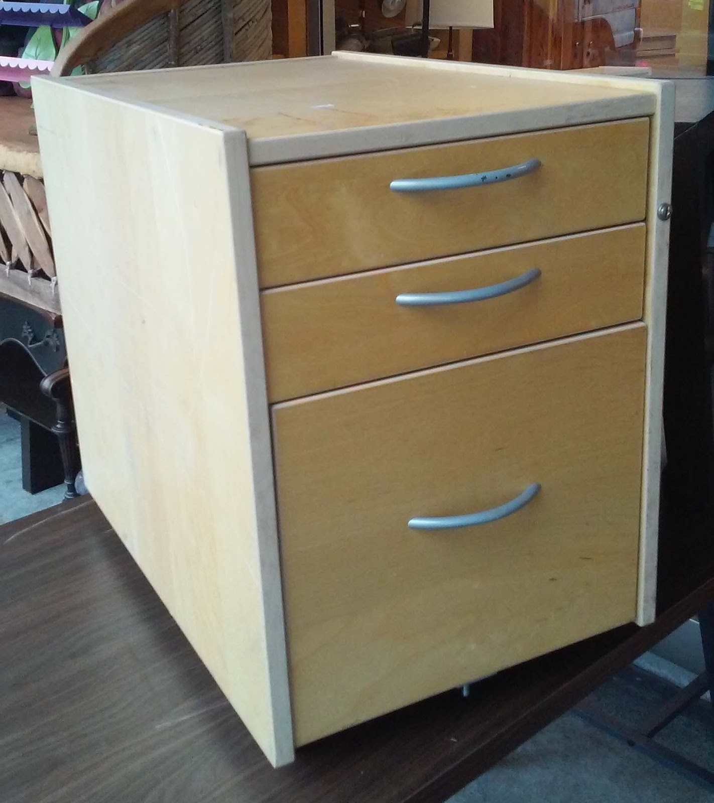 UHURU FURNITURE & COLLECTIBLES SOLD Ikea End Table on Wheels 1