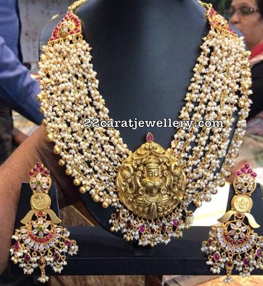 Small Pearls Necklace with Lakshmi Pendant Earrings Jewellery Designs