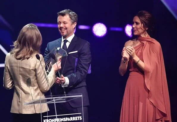 Crown Princess Mary wore a new bespoke gown by Danish fashion designer Soeren le Schmidt. Danish singer Jada, Emilie Molsted