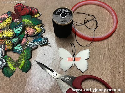 butterflies art journal page using stamps and other mixed media craft supplies