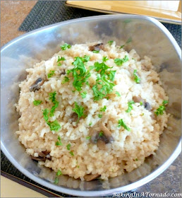 Simple Crockpot Risotto, a full flavor side dish. Arborio rice slow cooked in broth and wine. | Recipe developed by www.BakingInATornado.com | #recipe #crockpot #slowcooker