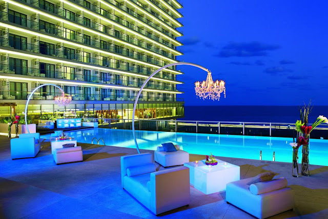 Defining elegance, the AAA Four Diamond Secrets The Vine Cancun is bordered by the cerulean waters of the Caribbean and white sand beaches in stunning Cancun.