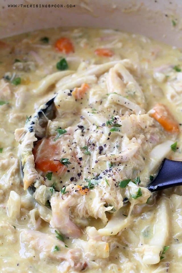 Homemade Creamy Chicken Noodle Soup Recipe on the stovetop