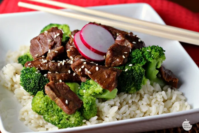 Slow Cooker Beef and Broccoli | by Renee's Kitchen Adventures sitting on white plate 