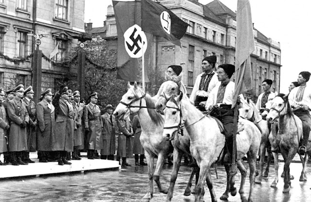 Joint German and Ukrainian parade, July 1941 worldwartwo.filminspector.com