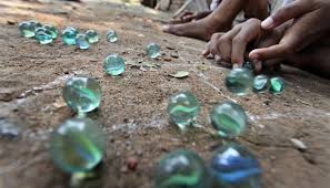 Traditional Games From Indonesia Kelereng Or Gundu