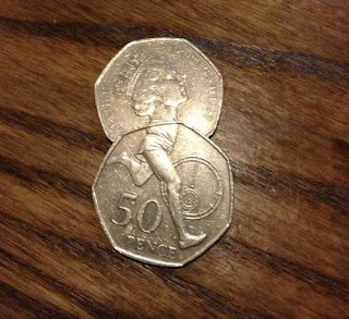 A 50p coin with legs of a runner lined up with another coin that has the head of Queen Elizabeth II, looks like one body