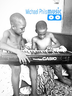 Nigerian children learning to play the piano