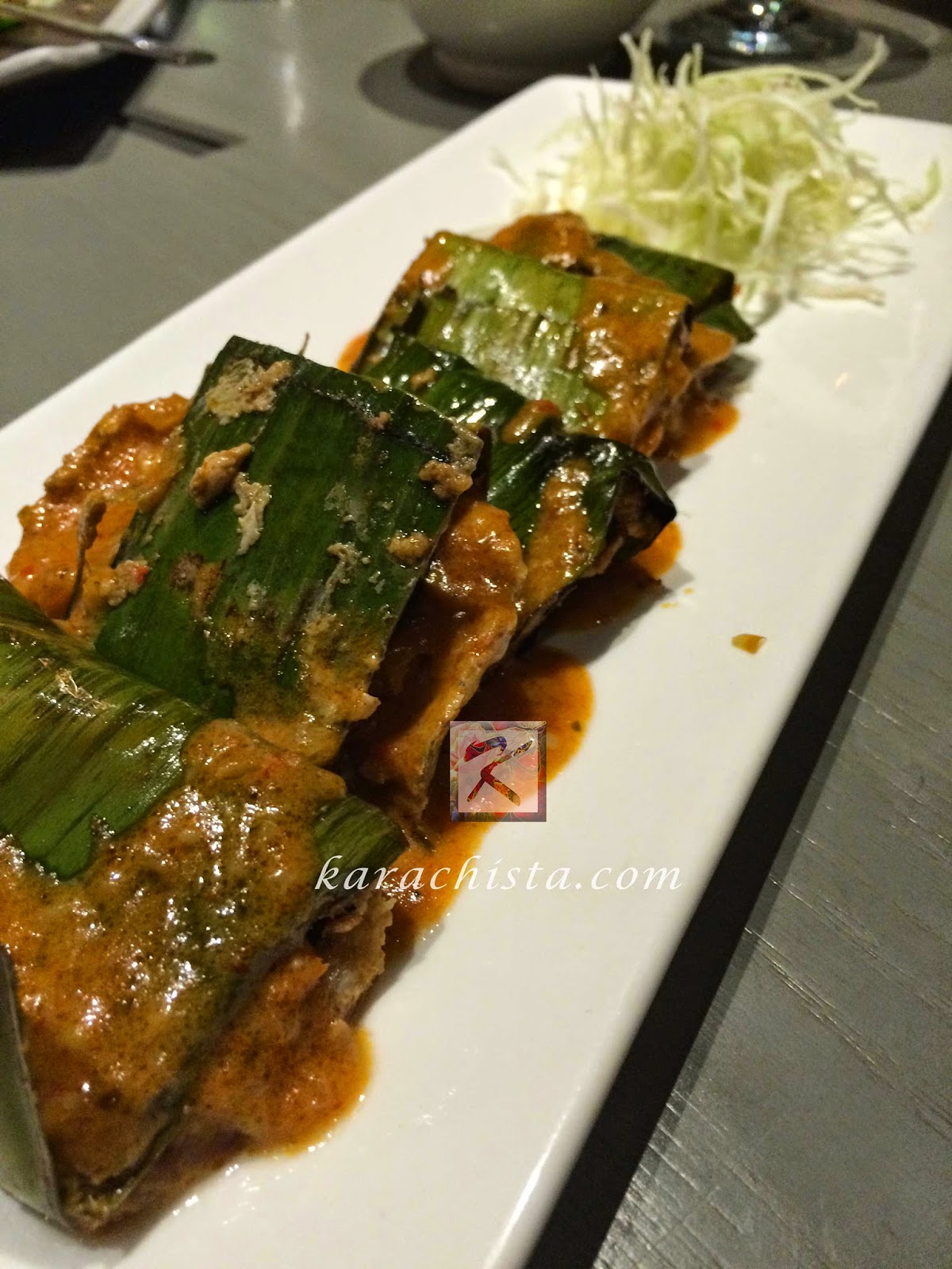 chargrilled fish in banana leaf Tao