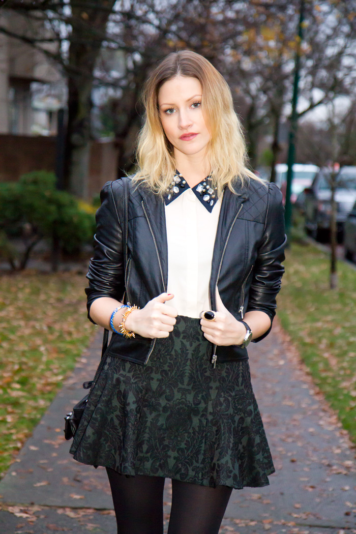 Vancouver Fashion Blogger, Alison Hutchinson, wearing Sugarlips Embedded Jewels Top, Forever 21 faux leather jacket, Zara brocade baroque skirt, Zara black ankle boots, Urban Outfitters spiked black leather bag, Stella & Dot Renegade Cluster Bracelet, True Worth Design bronze bead bracelet, and J Crew blue and gold bangle 