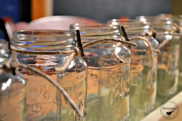 long line of glass mason jars