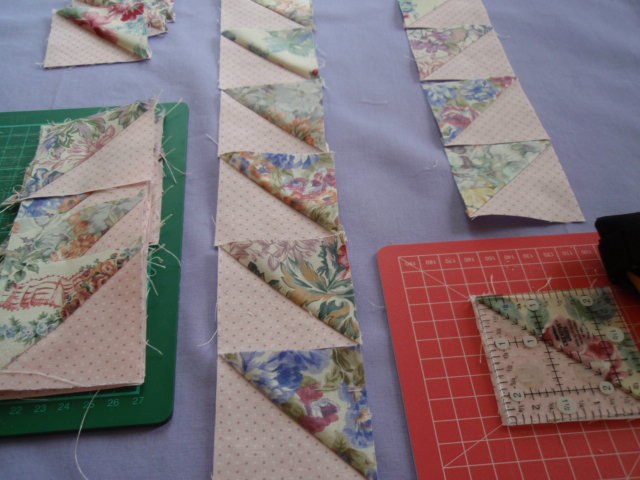 WIP - Quilting and Cross Stitch Trimming half-triangle blocks