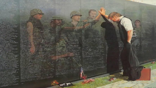 painting of man standing at the Vietnam memorial wall with reflections of the fallen looking back at him