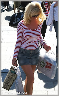 Girl in jean mini skirt on the street