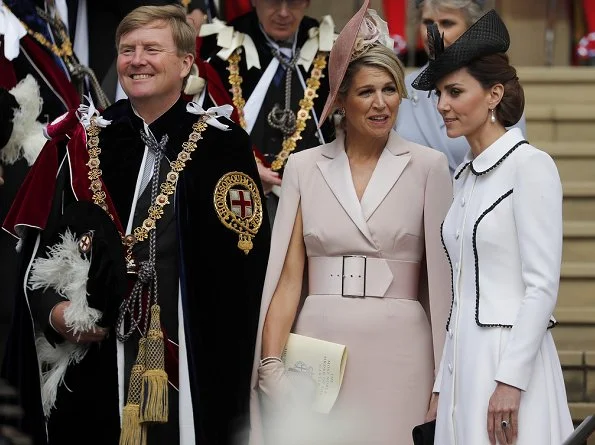 The Duchess is wearing Catherine Walker. Queen Maxima is wearing Claes Iversen. Queen Letizia wore a printed midi dress by Cherubina