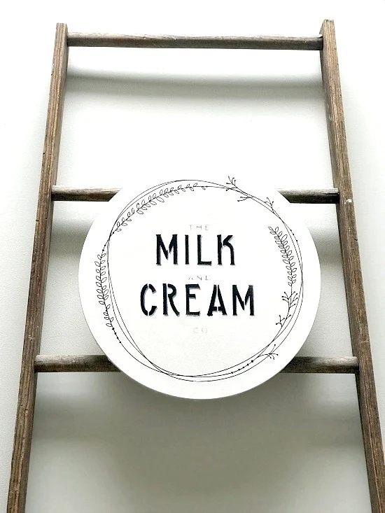 Large DIY farmhouse milk cap canvas on a ladder