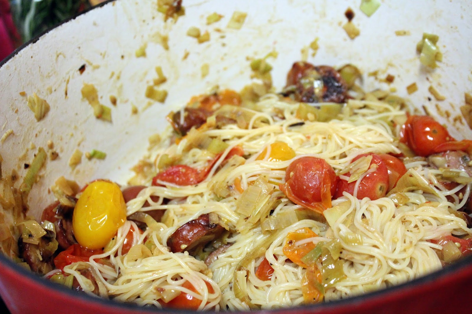 That's a mouthful! (Leek artichoke and tomato pasta with sausage and
