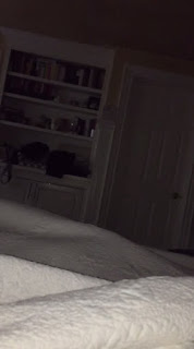 'Ghost' caught on camera singing along with child in bedroom (video)