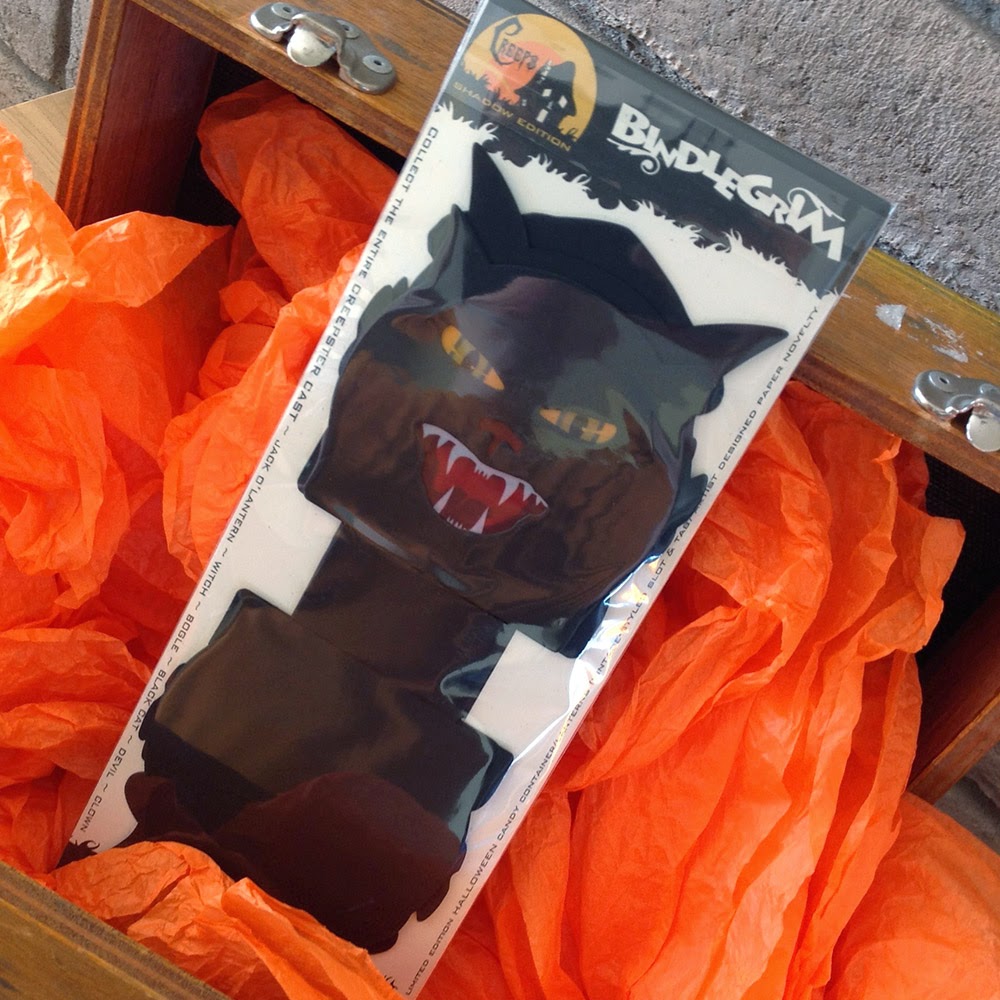 #3/5 limited edition set of halloween paper ephermera displayed in old crate box andd orange crepe paper.