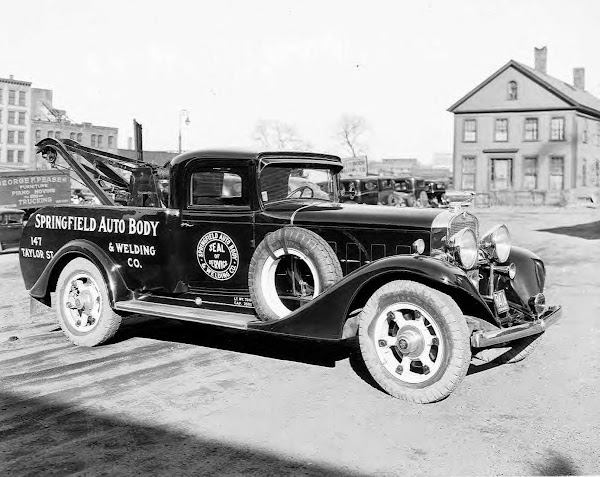 Cadillac tow truck ~
