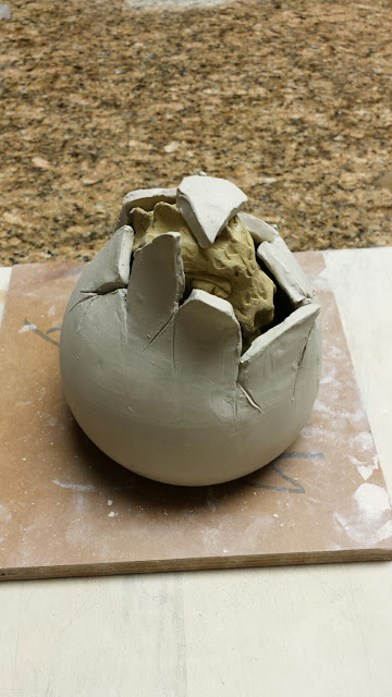 Hatching dragon pottery egg by Lily L, in progress.