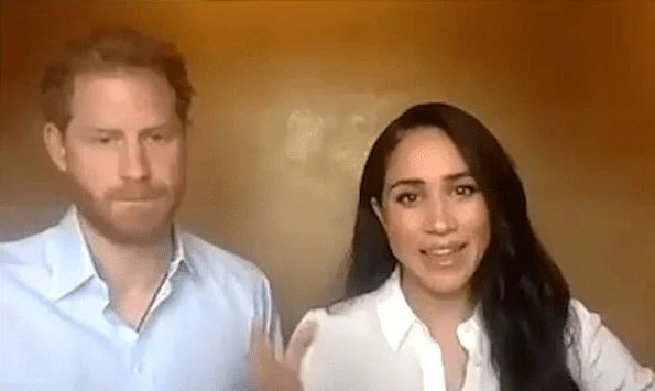 Meghan Markle wore Edge of Ember visionary charm gold necklace and wore Jigsaw Misha Nonoo the smart set shirt. Prince Harry