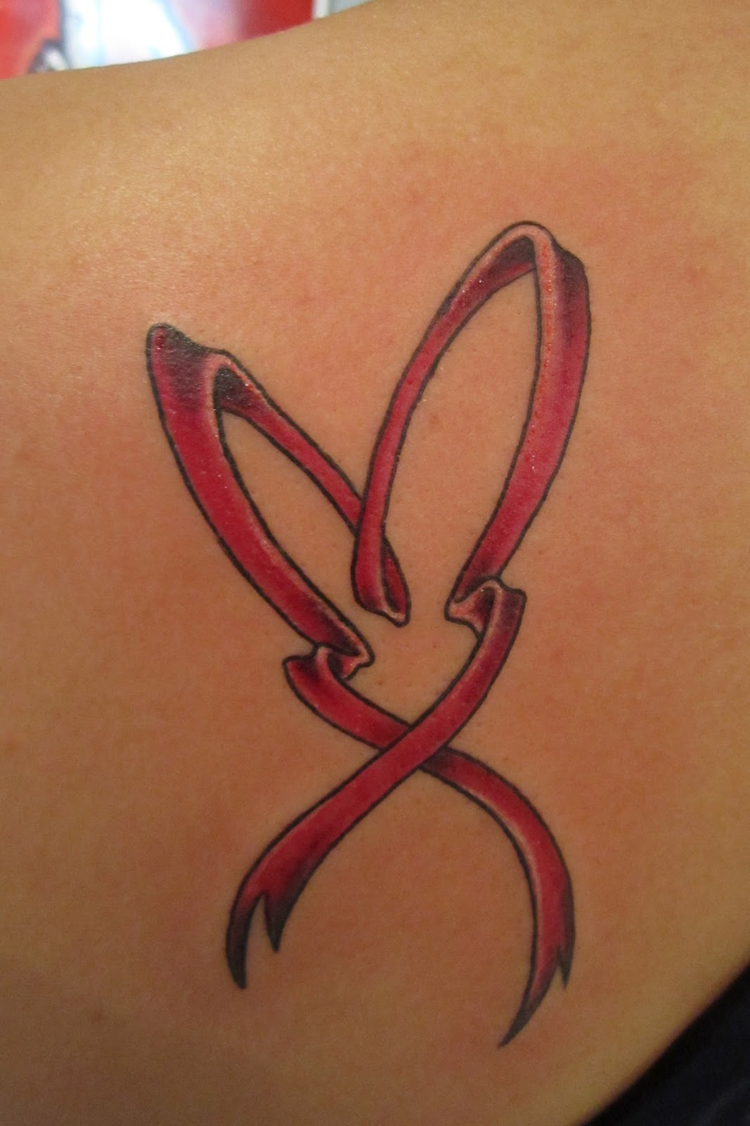 http://2.bp.blogspot.com/-WumS4HFDAjE/T94NRhHMPeI/AAAAAAAAAS0/e3DR6rSQ-Ck/s1600/kyle_mack_breast_cancer_ribbon_tattoo.jpg