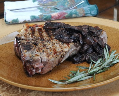 Pepper Steaks with Mushroom-Red Wine Sauce, sirloin or t-bone or ribeye steaks served with mushrooms cooked with red wine and rosemary until caramelized.