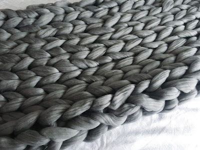 knitted grey blanket