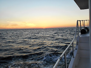 Sunset on a pretty much calmed down  Gulf of Mexico.