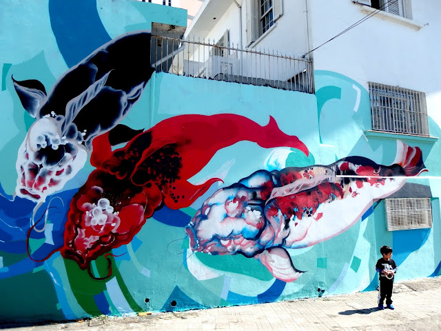 Brazilian Street Artist Titi Freak Newest Urban Mural In Sao Paulo, Brazil.
