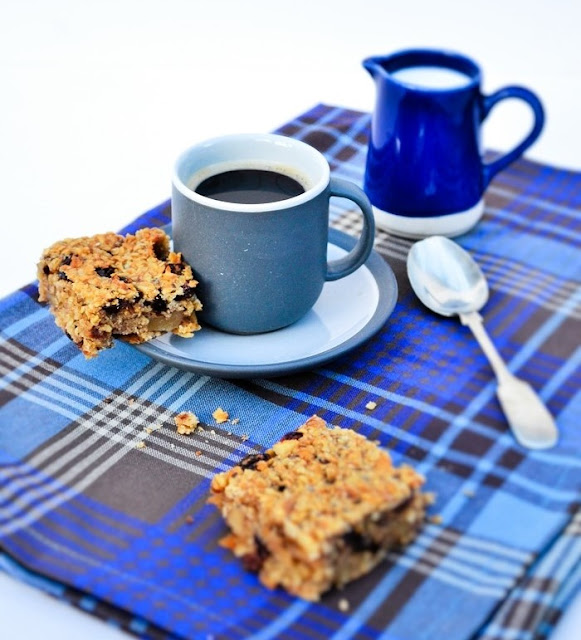 Scottish Oaty Walnut and Raisin Flapjacks with a cup of coffee