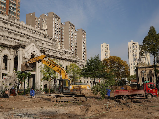 excavator and truck at Gudesi Temple