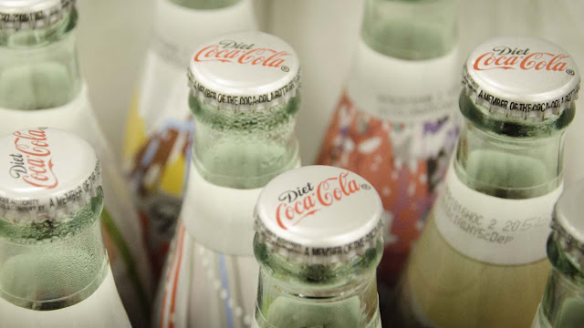 The €23.1 billion merger of three Coca-Cola bottlers to create a single company 