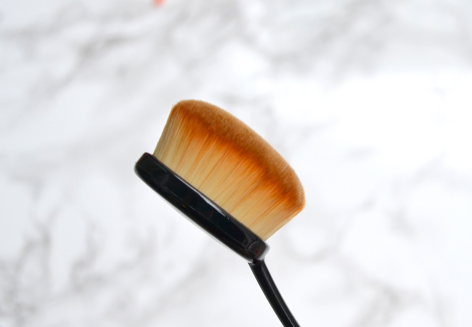 How do you use oval makeup brushes?