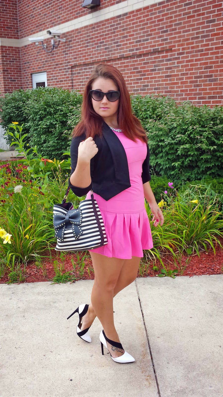 It's Nikki's World Whats black and white and pink all over?