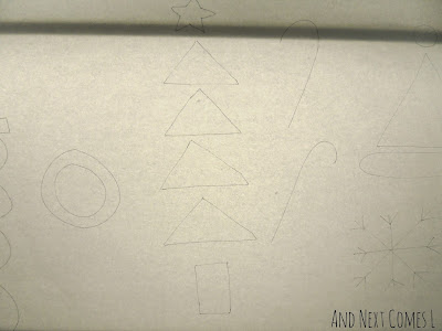 Christmas shapes ready for tracing on the light table from And Next Comes L
